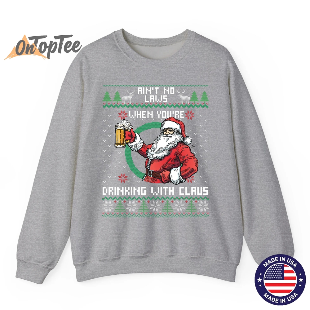 Aint No Laws When You’re Drinking With Claus Funny Christmas Sweatshirt Aint No Laws When You’re Drinking With Claus Funny Christmas Sweatshirt