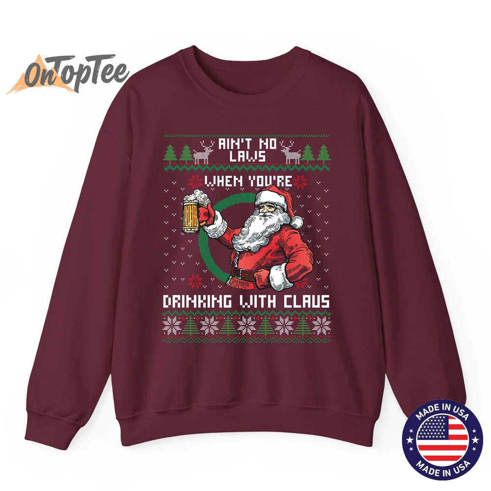 Aint No Laws When You’re Drinking With Claus Funny Christmas Sweatshirt Aint No Laws When You’re Drinking With Claus Funny Christmas Sweatshirt